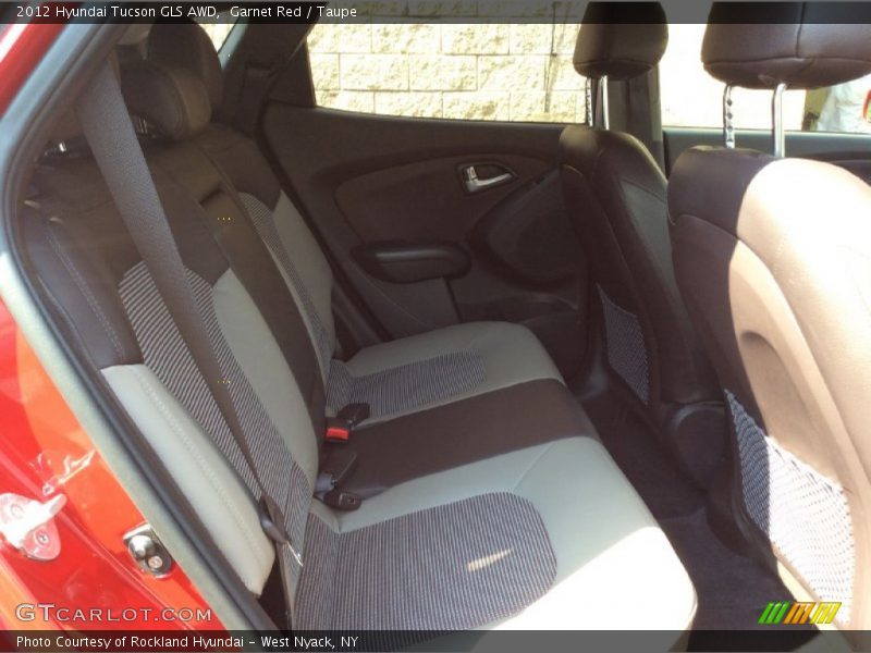 Garnet Red / Taupe 2012 Hyundai Tucson GLS AWD