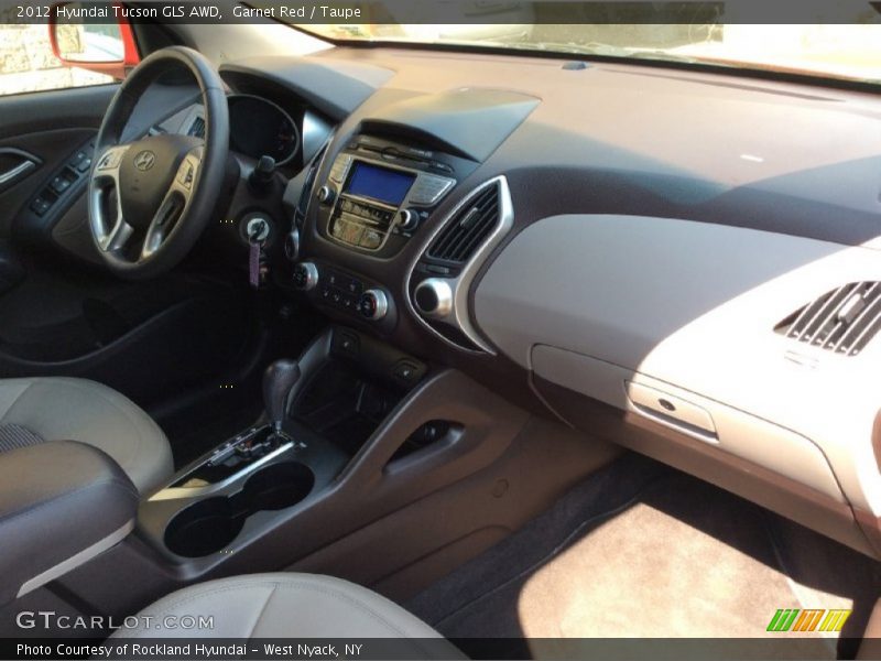 Garnet Red / Taupe 2012 Hyundai Tucson GLS AWD
