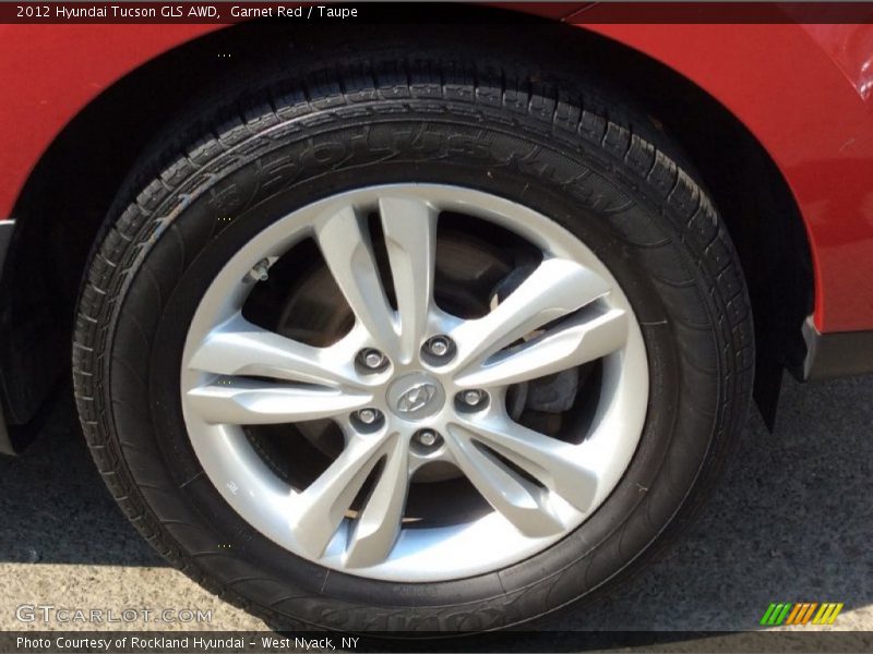 Garnet Red / Taupe 2012 Hyundai Tucson GLS AWD