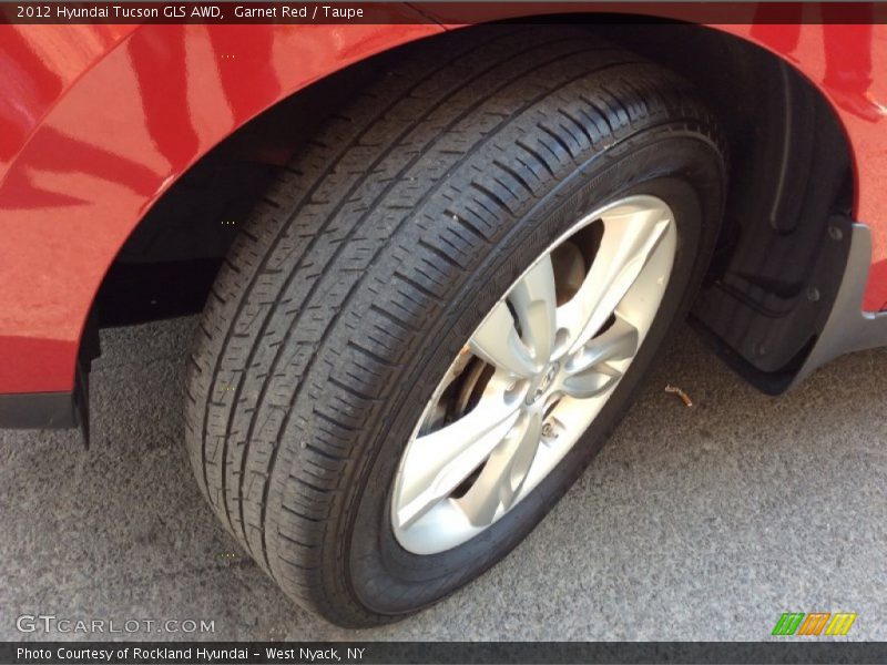 Garnet Red / Taupe 2012 Hyundai Tucson GLS AWD