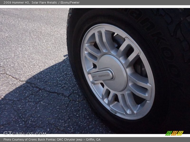 Solar Flare Metallic / Ebony/Pewter 2009 Hummer H3