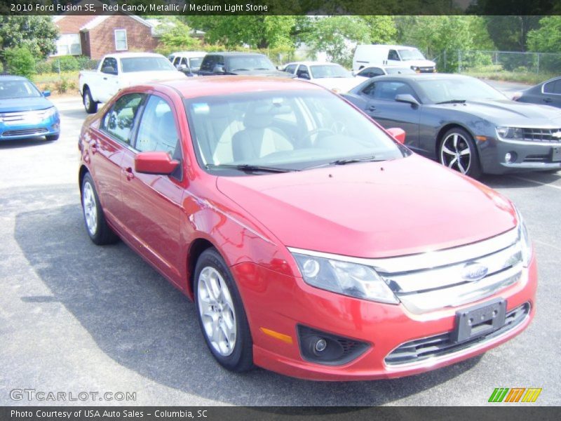 Red Candy Metallic / Medium Light Stone 2010 Ford Fusion SE