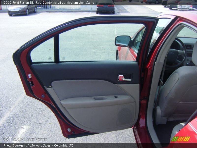 Red Candy Metallic / Medium Light Stone 2010 Ford Fusion SE