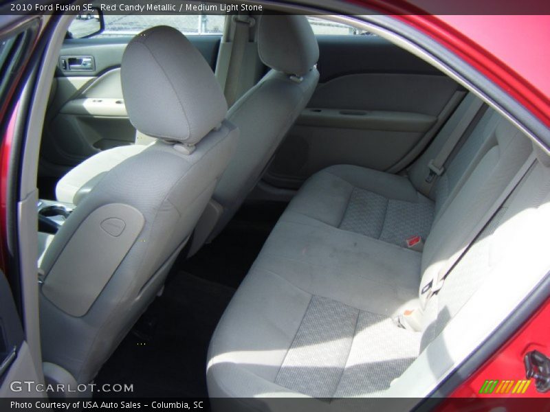 Red Candy Metallic / Medium Light Stone 2010 Ford Fusion SE
