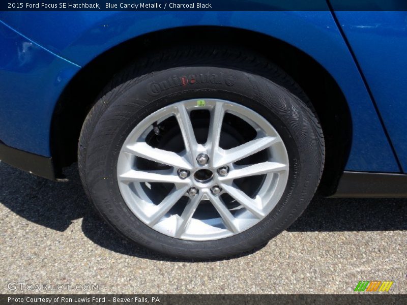 Blue Candy Metallic / Charcoal Black 2015 Ford Focus SE Hatchback