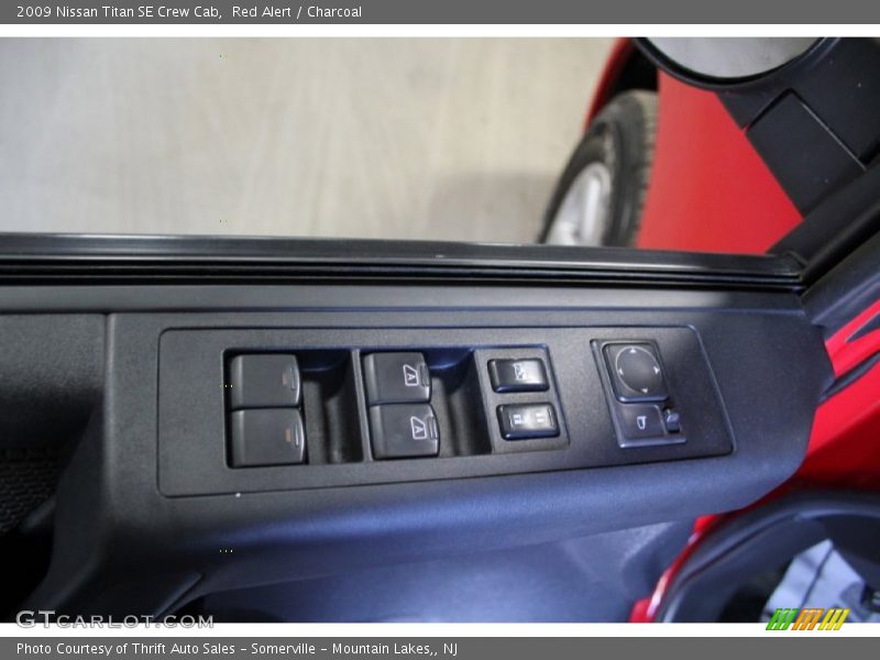 Red Alert / Charcoal 2009 Nissan Titan SE Crew Cab