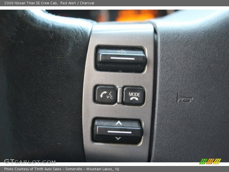 Red Alert / Charcoal 2009 Nissan Titan SE Crew Cab