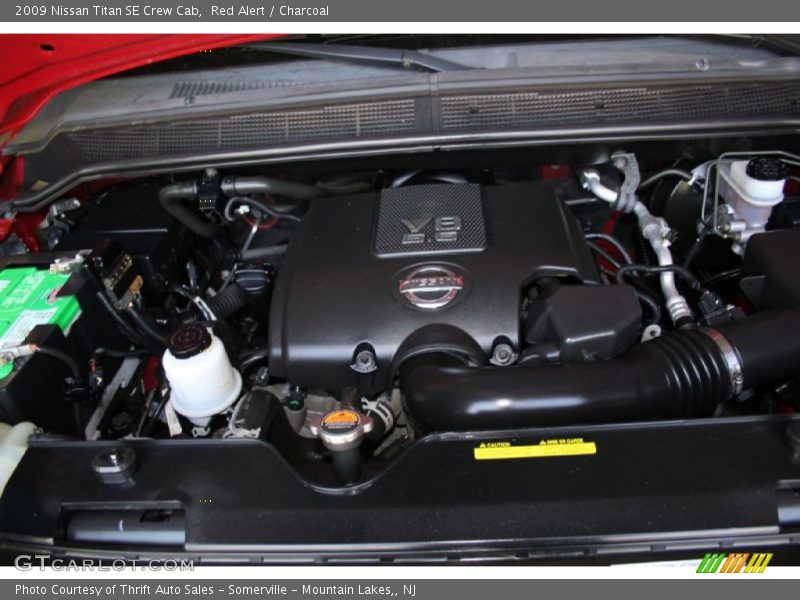 Red Alert / Charcoal 2009 Nissan Titan SE Crew Cab
