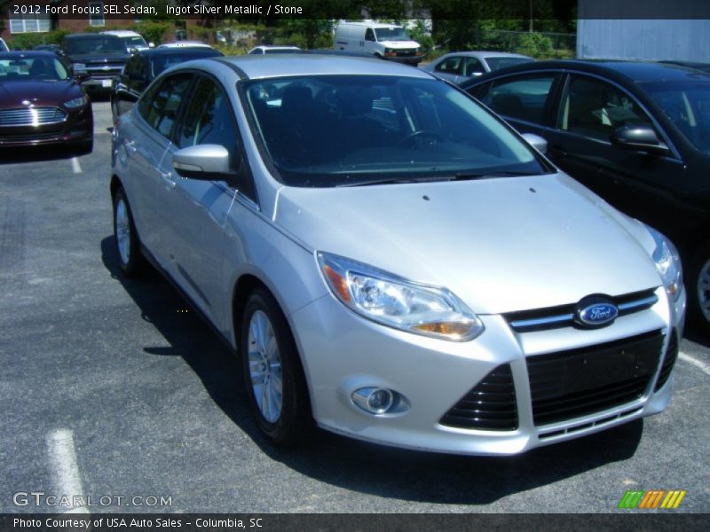 Ingot Silver Metallic / Stone 2012 Ford Focus SEL Sedan