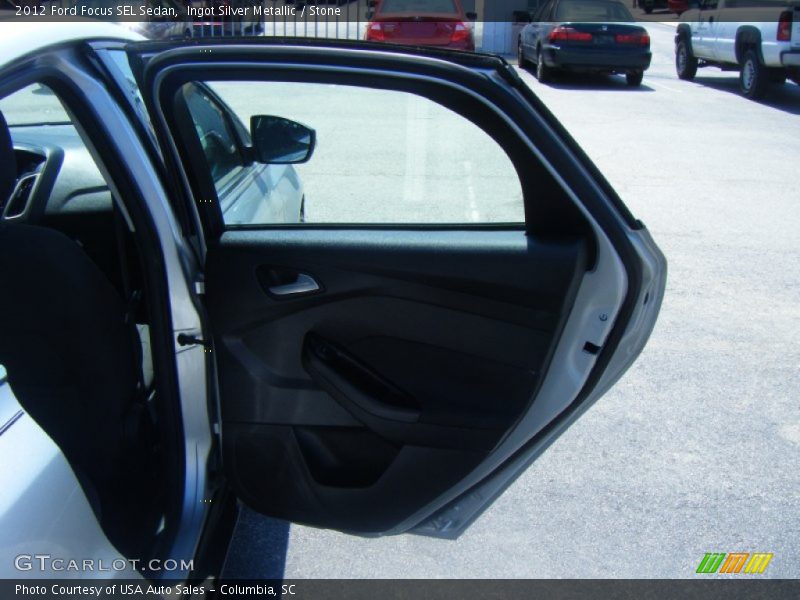 Ingot Silver Metallic / Stone 2012 Ford Focus SEL Sedan
