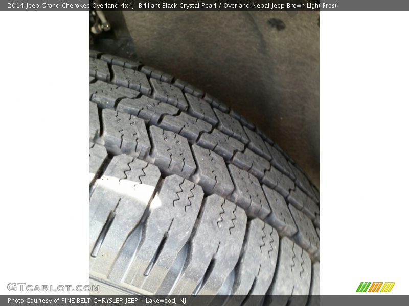Brilliant Black Crystal Pearl / Overland Nepal Jeep Brown Light Frost 2014 Jeep Grand Cherokee Overland 4x4