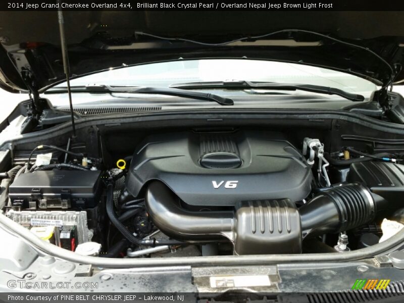 Brilliant Black Crystal Pearl / Overland Nepal Jeep Brown Light Frost 2014 Jeep Grand Cherokee Overland 4x4