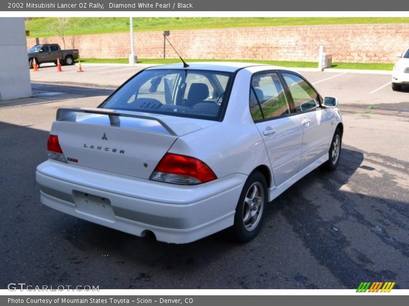 Diamond White Pearl / Black 2002 Mitsubishi Lancer OZ Rally