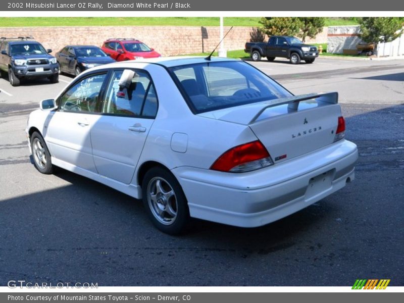 Diamond White Pearl / Black 2002 Mitsubishi Lancer OZ Rally