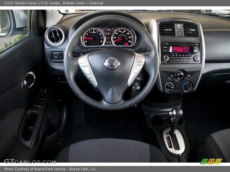 Brilliant Silver / Charcoal 2015 Nissan Versa 1.6 SV Sedan