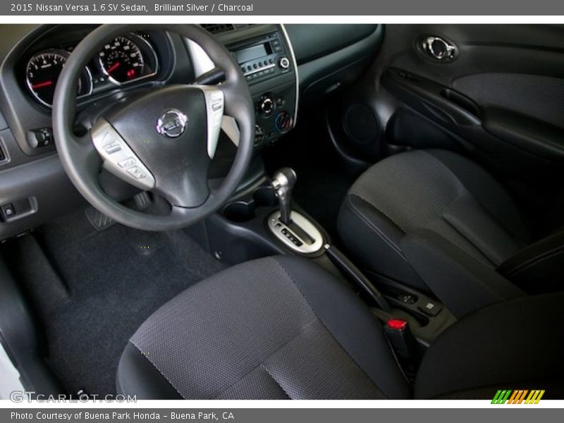 Brilliant Silver / Charcoal 2015 Nissan Versa 1.6 SV Sedan