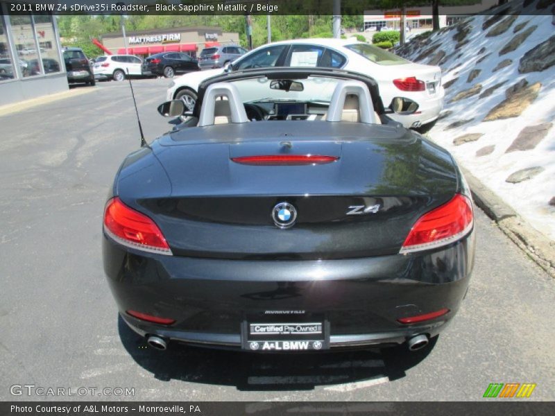 Black Sapphire Metallic / Beige 2011 BMW Z4 sDrive35i Roadster