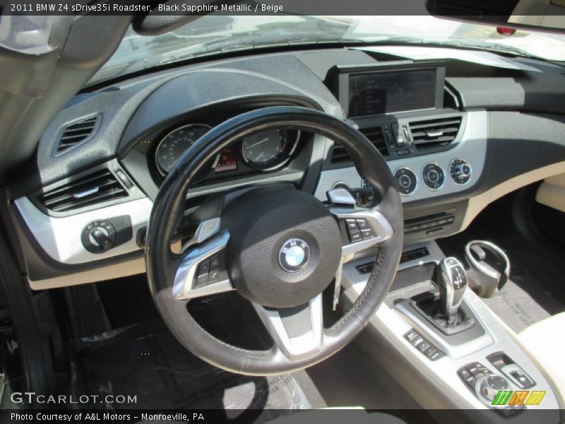 Black Sapphire Metallic / Beige 2011 BMW Z4 sDrive35i Roadster