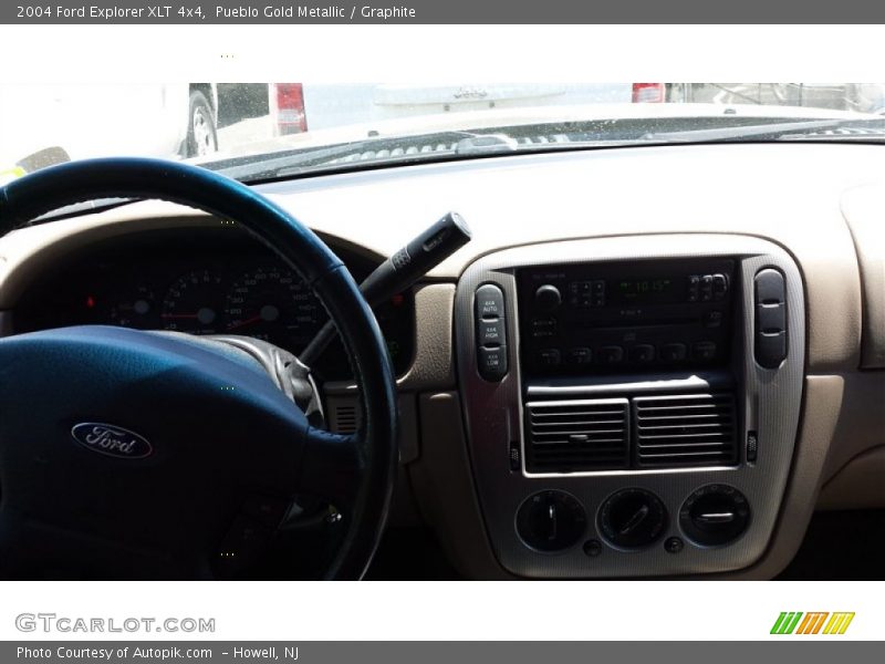 Pueblo Gold Metallic / Graphite 2004 Ford Explorer XLT 4x4