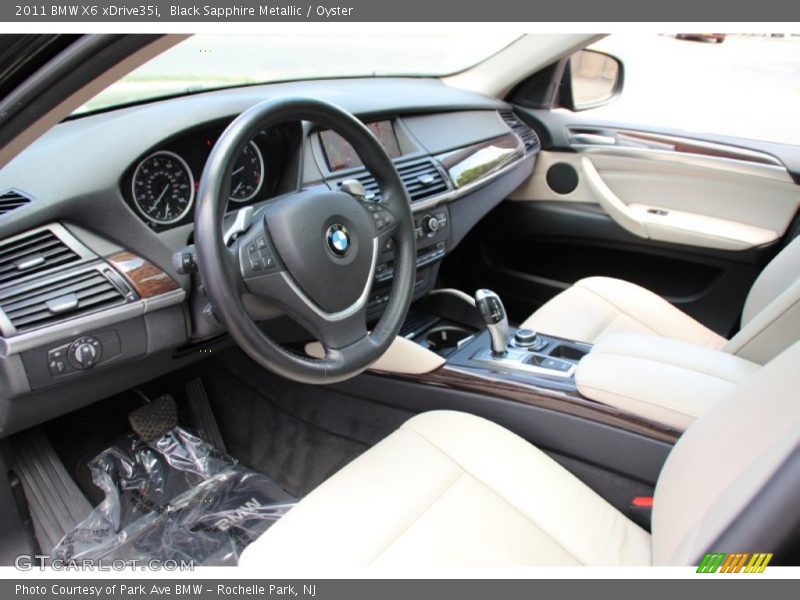Black Sapphire Metallic / Oyster 2011 BMW X6 xDrive35i