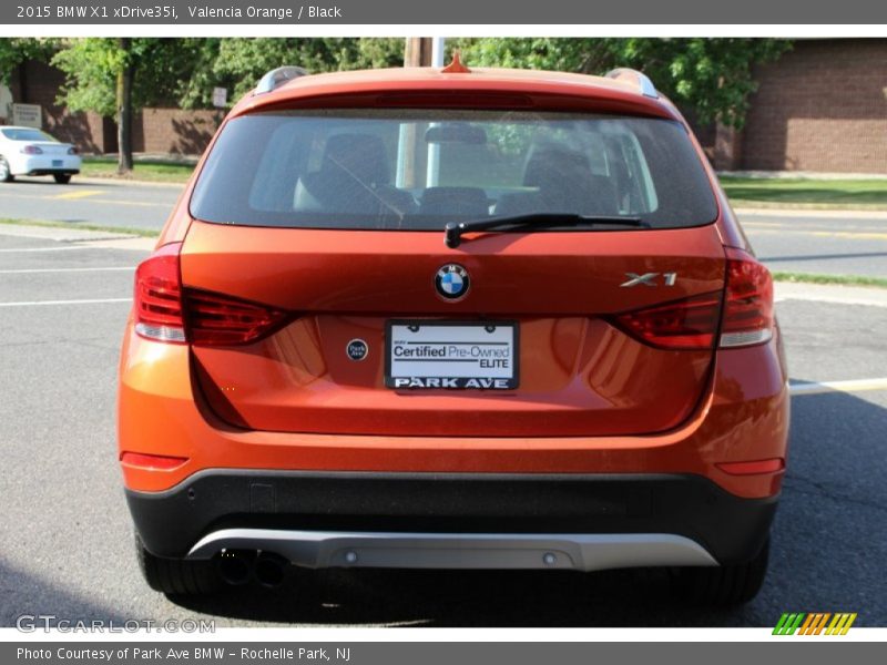 Valencia Orange / Black 2015 BMW X1 xDrive35i