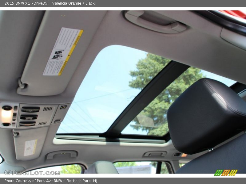Valencia Orange / Black 2015 BMW X1 xDrive35i