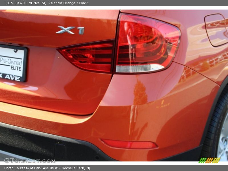 Valencia Orange / Black 2015 BMW X1 xDrive35i