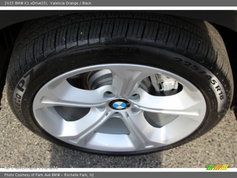 Valencia Orange / Black 2015 BMW X1 xDrive35i