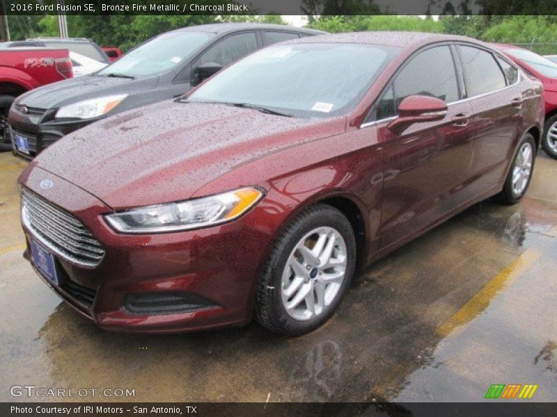 Bronze Fire Metallic / Charcoal Black 2016 Ford Fusion SE