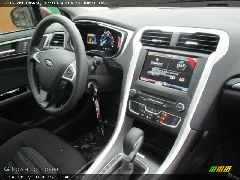 Bronze Fire Metallic / Charcoal Black 2016 Ford Fusion SE