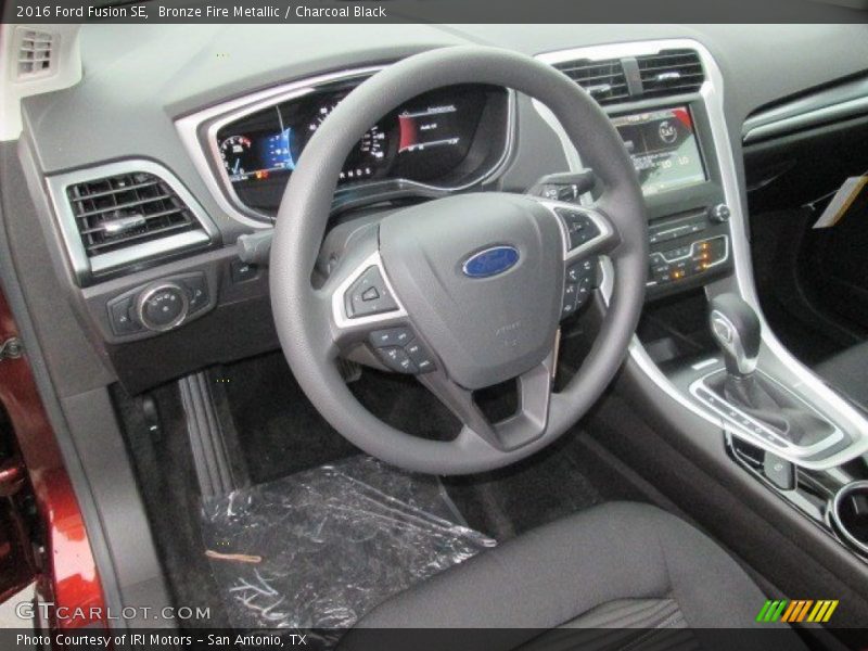 Bronze Fire Metallic / Charcoal Black 2016 Ford Fusion SE