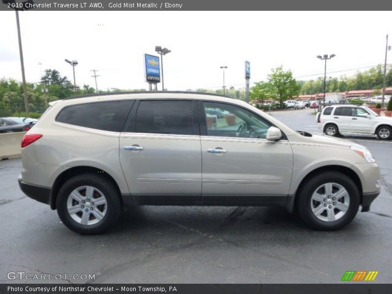 Gold Mist Metallic / Ebony 2010 Chevrolet Traverse LT AWD