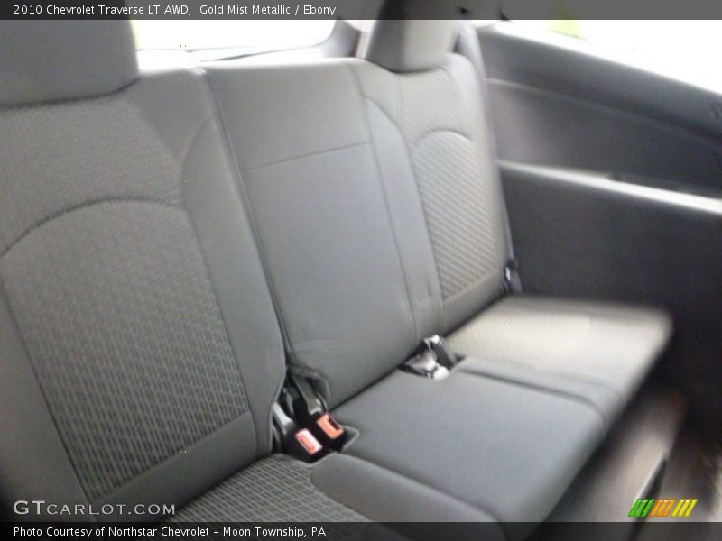 Gold Mist Metallic / Ebony 2010 Chevrolet Traverse LT AWD