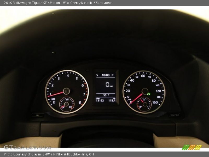 Wild Cherry Metallic / Sandstone 2010 Volkswagen Tiguan SE 4Motion