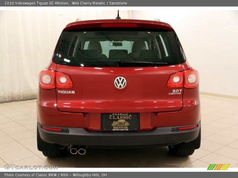 Wild Cherry Metallic / Sandstone 2010 Volkswagen Tiguan SE 4Motion