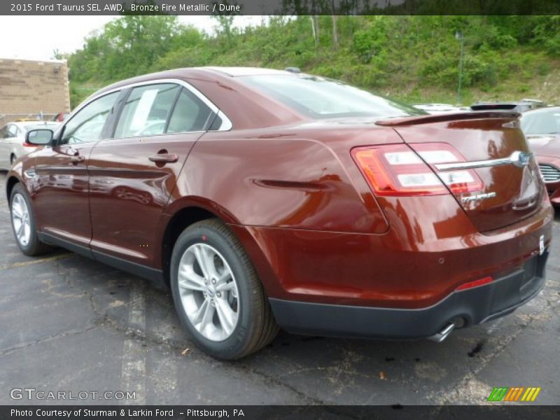 Bronze Fire Metallic / Dune 2015 Ford Taurus SEL AWD