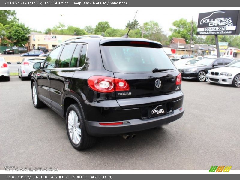 Deep Black Metallic / Sandstone 2010 Volkswagen Tiguan SE 4Motion