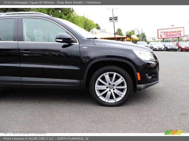 Deep Black Metallic / Sandstone 2010 Volkswagen Tiguan SE 4Motion