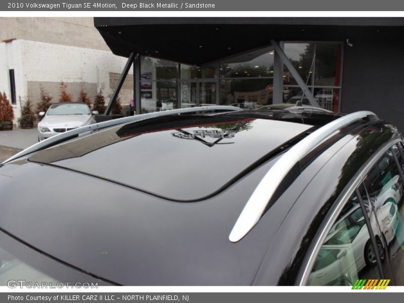 Deep Black Metallic / Sandstone 2010 Volkswagen Tiguan SE 4Motion