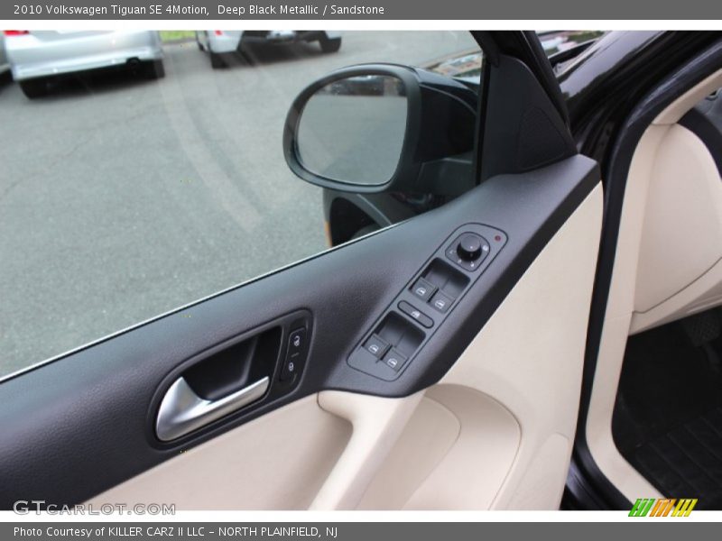 Deep Black Metallic / Sandstone 2010 Volkswagen Tiguan SE 4Motion