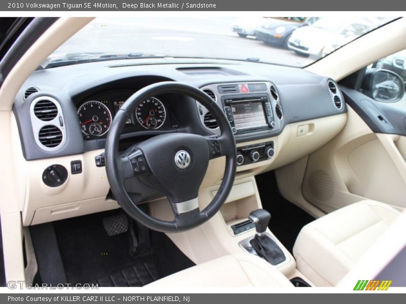 Deep Black Metallic / Sandstone 2010 Volkswagen Tiguan SE 4Motion