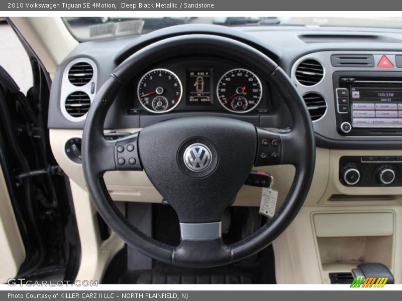 Deep Black Metallic / Sandstone 2010 Volkswagen Tiguan SE 4Motion