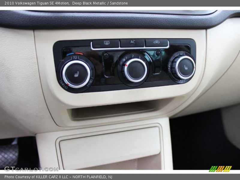 Deep Black Metallic / Sandstone 2010 Volkswagen Tiguan SE 4Motion
