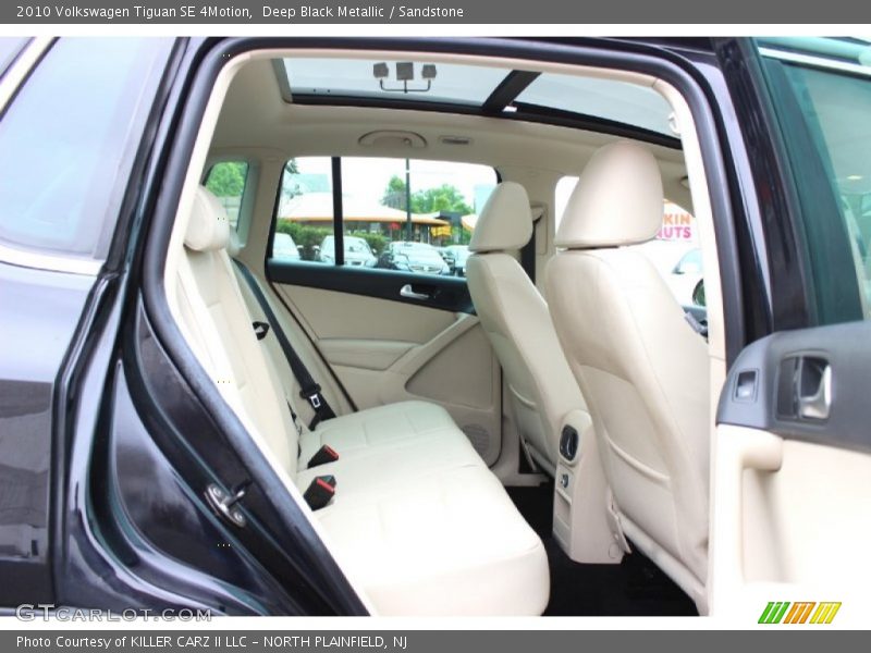 Deep Black Metallic / Sandstone 2010 Volkswagen Tiguan SE 4Motion