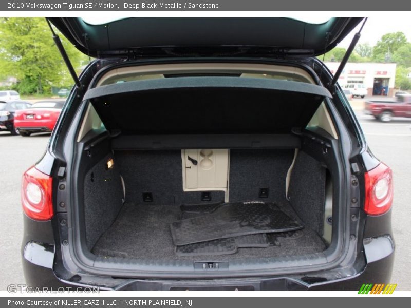 Deep Black Metallic / Sandstone 2010 Volkswagen Tiguan SE 4Motion