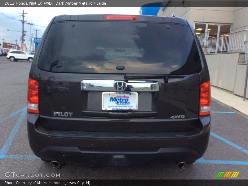 Dark Amber Metallic / Beige 2012 Honda Pilot EX 4WD