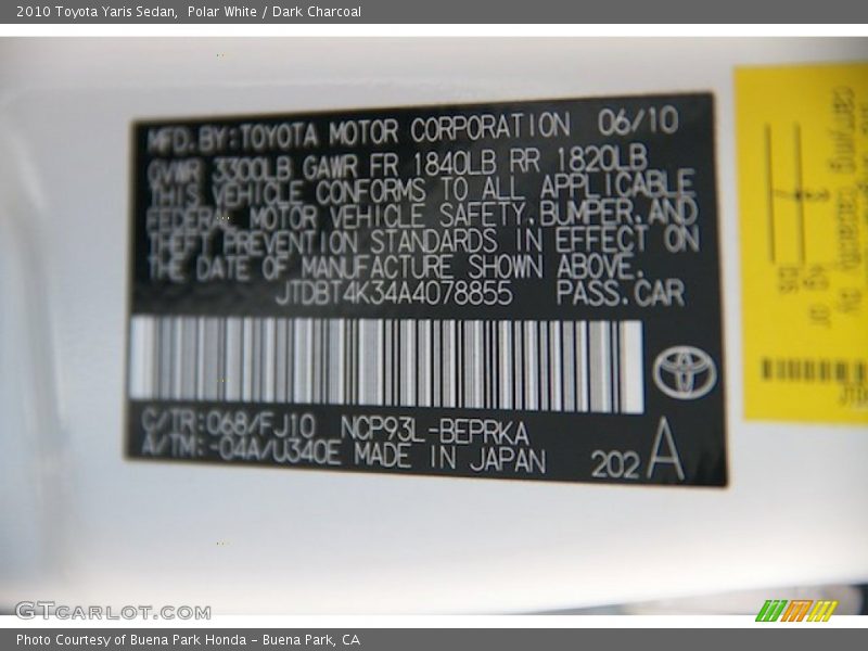 Polar White / Dark Charcoal 2010 Toyota Yaris Sedan