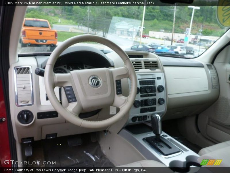 Vivid Red Metallic / Cashmere Leather/Charcoal Black 2009 Mercury Mariner Premier V6