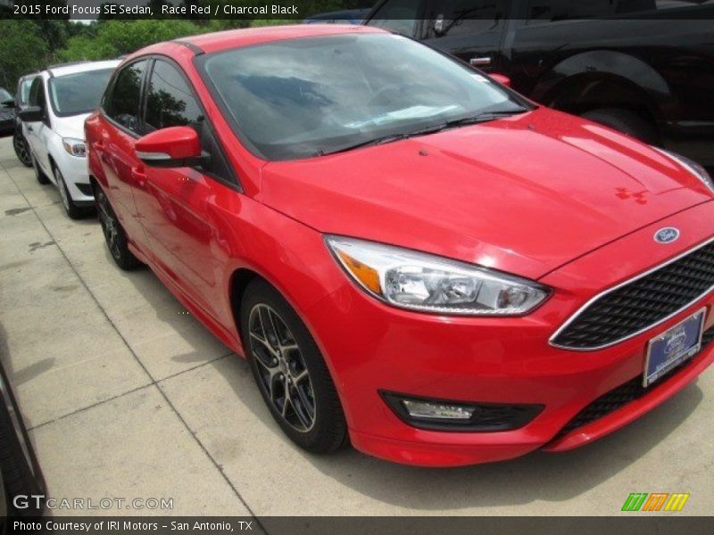 Race Red / Charcoal Black 2015 Ford Focus SE Sedan