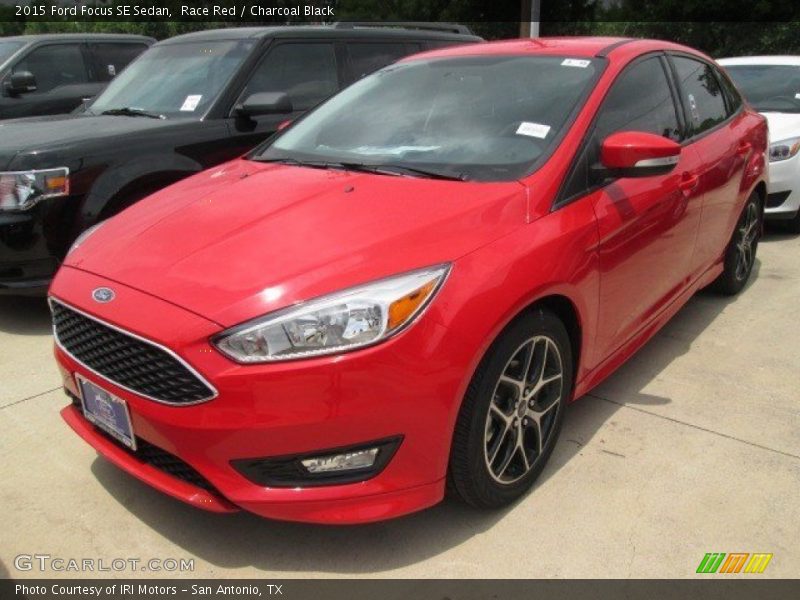 Race Red / Charcoal Black 2015 Ford Focus SE Sedan
